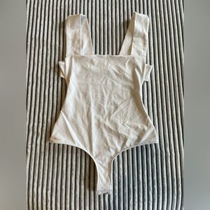 Free People activewear bodysuit (open back) size M